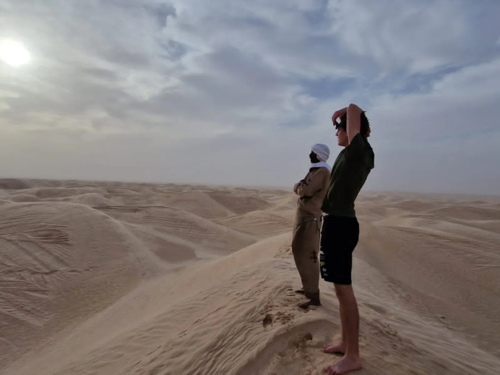 Wild camping on the open dunes of the Tunisian Sahara at night